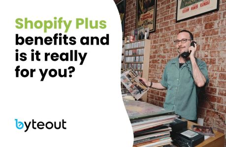 Cover image for a blog post on Shopify Plus benefits. A man in a green shirt holding a vinyl record while talking on a retro phone, standing in a vintage record shop. Text overlay reads: 'Shopify Plus benefits and is it really for you?' with Byteout logo.