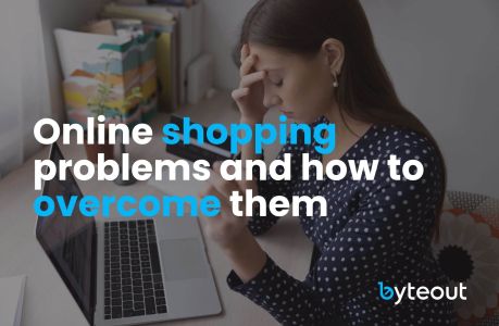 Cover image for a blog post. A woman sitting at a desk with her hand on her forehead, looking stressed while using a laptop, with the text 'Online shopping problems and how to overcome them' and a Byteout logo.